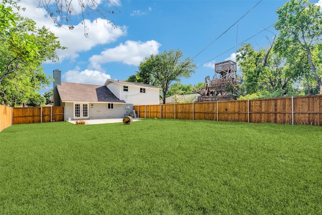 2223 Foxcroft Cir, Denton, TX 76209 - view of yard with french doors, a fenced backyard, and a patio area