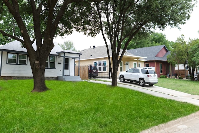 ranch-style house with a front yard
