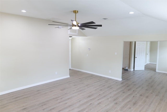 unfurnished room featuring recessed lighting, a ceiling fan, light wood finished floors, and vaulted ceiling