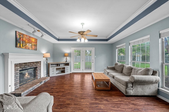 230 Peyton Colquitt Pl, Shreveport, LA 71115 - living room with ornamental molding, a ceiling fan, a tray ceiling, and wood finished floors