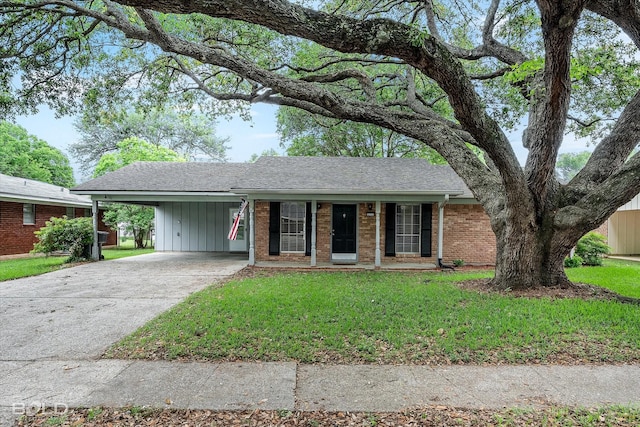 230 Peyton Colquitt Pl, Shreveport, LA 71115 - single story home with brick siding, a carport, driveway, and a front lawn