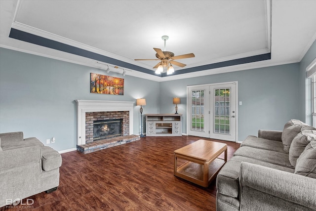 230 Peyton Colquitt Pl, Shreveport, LA 71115 - living room featuring crown molding, ceiling fan, wood finished floors, and a tray ceiling