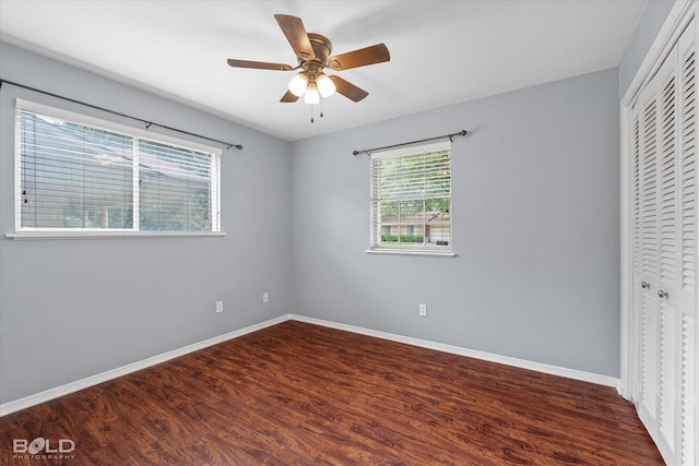 230 Peyton Colquitt Pl, Shreveport, LA 71115 - unfurnished bedroom featuring a ceiling fan, baseboards, wood finished floors, and a closet