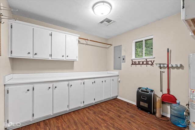 230 Peyton Colquitt Pl, Shreveport, LA 71115 - clothes washing area with baseboards, electric panel, dark wood-type flooring, and visible vents