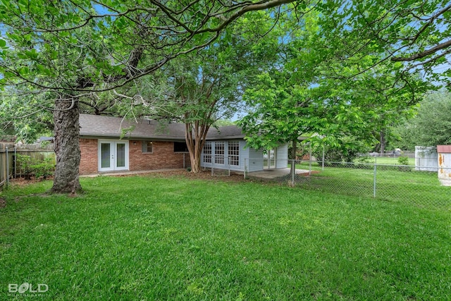 230 Peyton Colquitt Pl, Shreveport, LA 71115 - view of yard with french doors and a fenced backyard