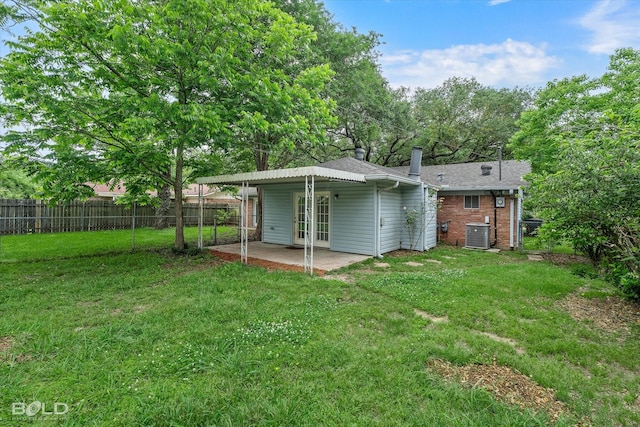 230 Peyton Colquitt Pl, Shreveport, LA 71115 - rear view of property featuring a lawn, fence, french doors, and a patio