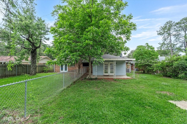 230 Peyton Colquitt Pl, Shreveport, LA 71115 - back of property featuring a lawn, a fenced backyard, and a patio area