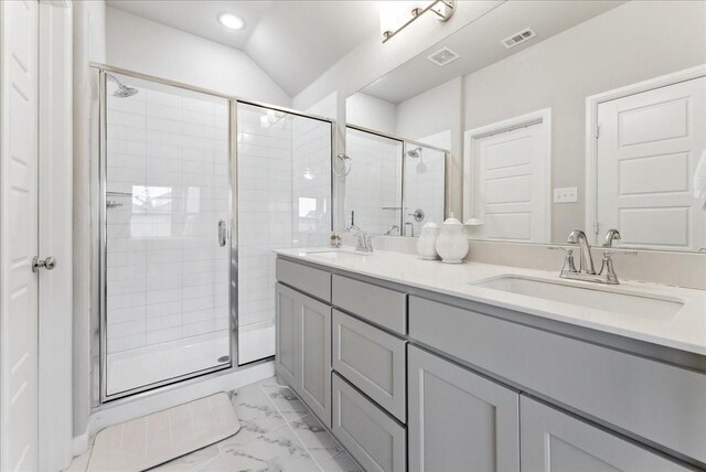 bathroom featuring a sink, visible vents, a shower stall, and marble finish floor