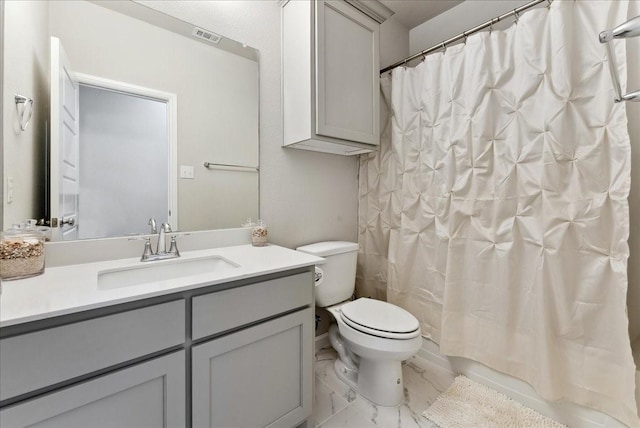 bathroom featuring toilet, visible vents, marble finish floor, and vanity