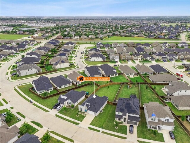 drone / aerial view with a residential view