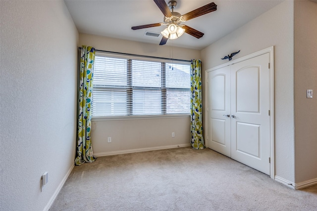 217 Brick Row Dr, Richardson, TX 75081 - spare room with baseboards, a ceiling fan, carpet flooring, and visible vents