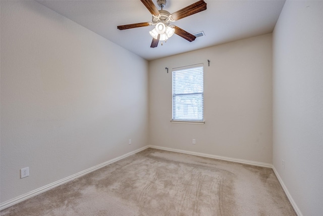 217 Brick Row Dr, Richardson, TX 75081 - empty room with baseboards, ceiling fan, visible vents, and light carpet