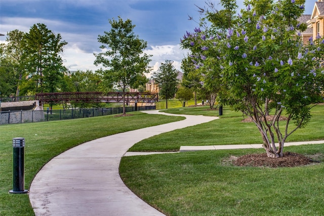 217 Brick Row Dr, Richardson, TX 75081 - view of home's community featuring a lawn and fence
