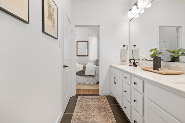 full bath with double vanity and a sink