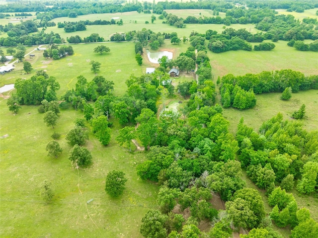 birds eye view of property featuring a rural view