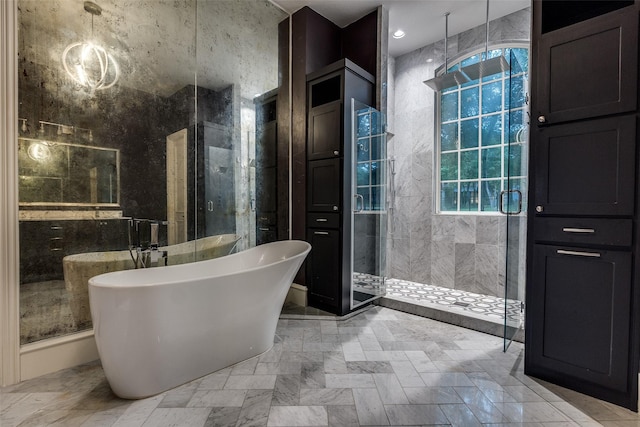 full bath with a stall shower and a soaking tub