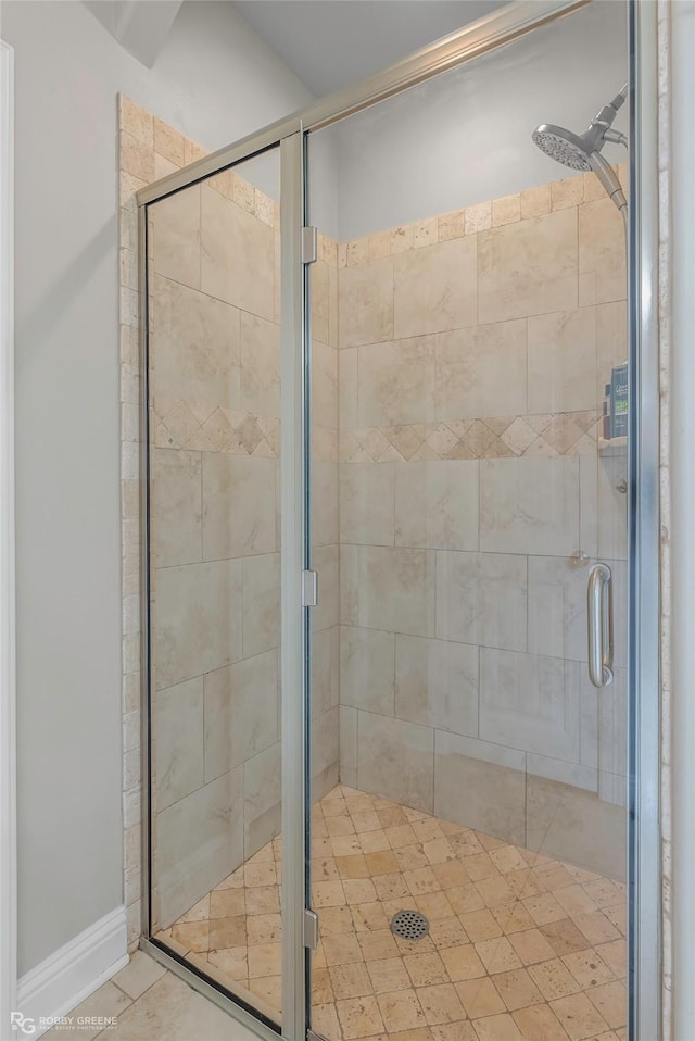 206 Jamestowne Blvd, Benton, LA 71006 - bathroom featuring tile patterned flooring and a stall shower