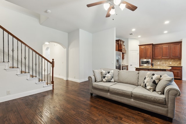 4324 Ashburn Way, Fort Worth, TX 76244 - living area with arched walkways, a ceiling fan, dark wood finished floors, stairway, and recessed lighting