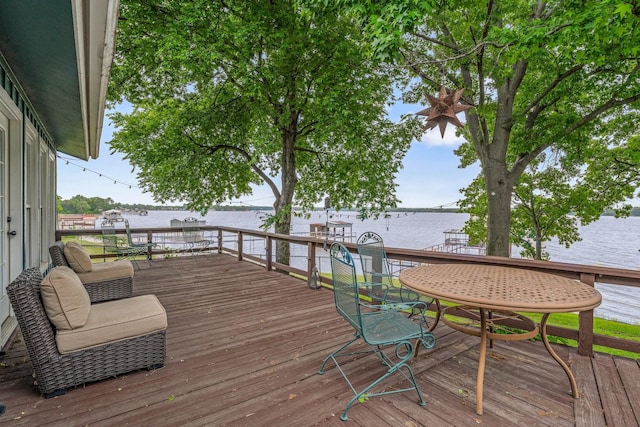 deck featuring a water view