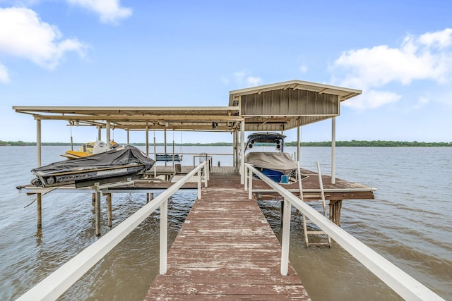 dock area featuring a water view and boat lift