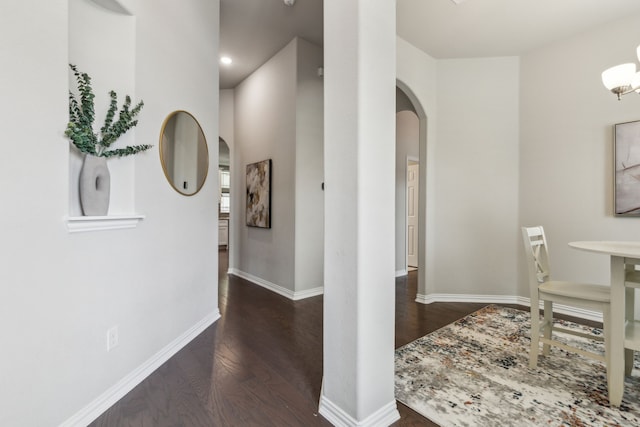 1101 Helmsley Dr, Frisco, TX 75036 - interior space featuring baseboards, arched walkways, wood finished floors, and recessed lighting