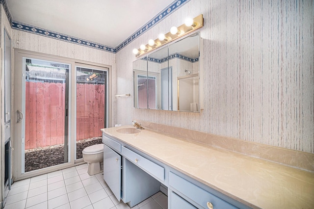 bathroom featuring wallpapered walls, toilet, tile patterned flooring, and vanity
