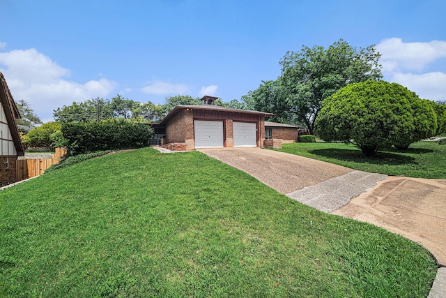 view of front of house with fence, an attached garage, brick siding, concrete driveway, and a front lawn