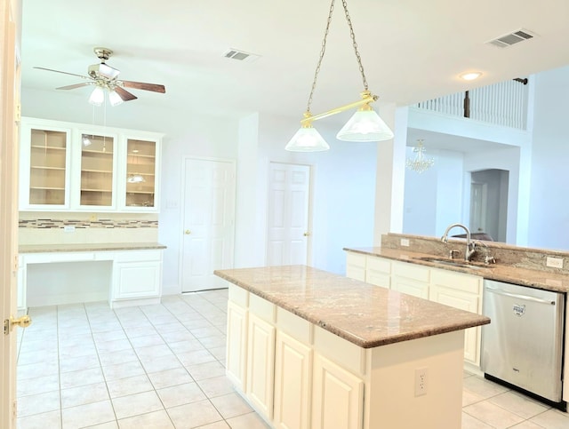 kitchen with a ceiling fan, visible vents, stainless steel dishwasher, a sink, and light tile patterned flooring