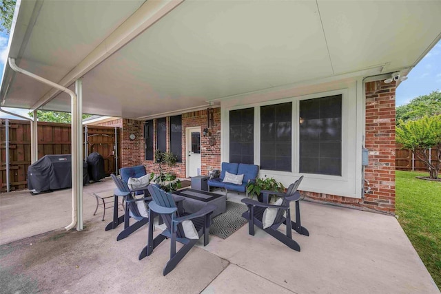 view of patio / terrace with outdoor lounge area, fence, and grilling area
