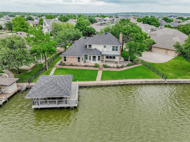 aerial view featuring a water view and a residential view