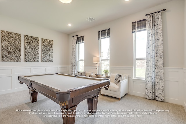 playroom with visible vents, wainscoting, and a decorative wall