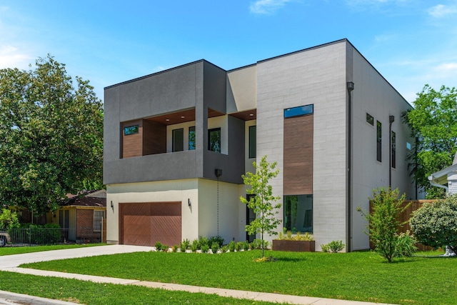 9409 Lenel Pl, Dallas, TX 75220 - modern home featuring an attached garage, concrete driveway, and stucco siding