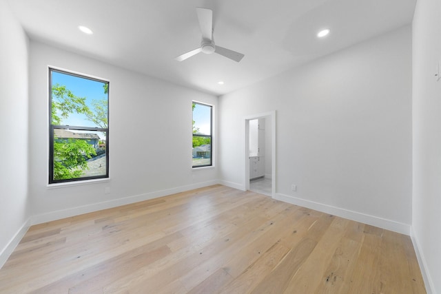 9409 Lenel Pl, Dallas, TX 75220 - unfurnished room featuring light wood-type flooring, a ceiling fan, recessed lighting, and baseboards