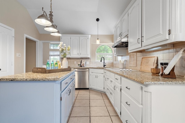 kitchen featuring stainless steel dishwasher, a sink, white cabinetry, and under cabinet range hood