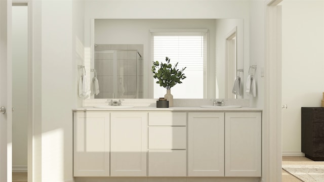 3737 Seth Pl, Mesquite, TX 75181 - bathroom featuring a sink, baseboards, a stall shower, and double vanity