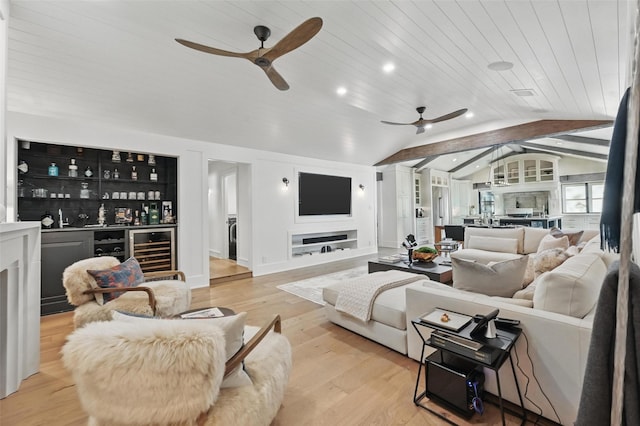 living room with ceiling fan, a dry bar, wooden ceiling, wood finished floors, and lofted ceiling