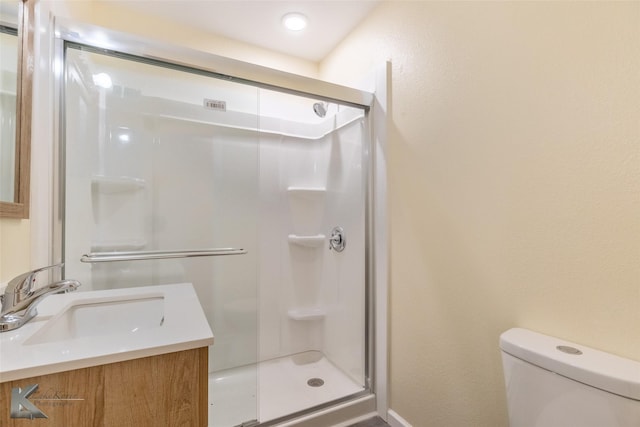 415 Sweetwater Rd, Bronte, TX 76933 - bathroom featuring vanity, toilet, and a shower stall