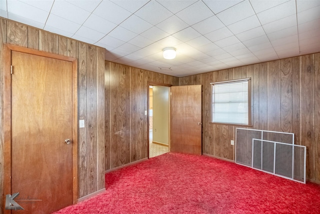 415 Sweetwater Rd, Bronte, TX 76933 - unfurnished bedroom with carpet floors and wooden walls