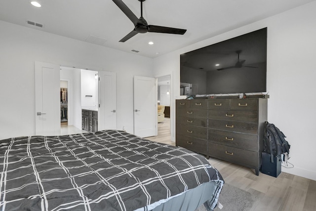 bedroom with visible vents, recessed lighting, and light wood finished floors