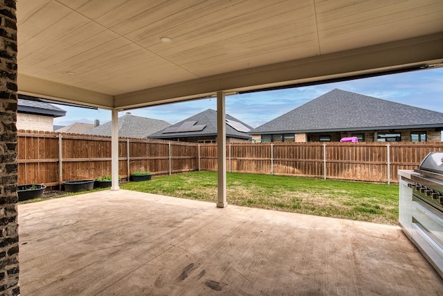 view of patio with a fenced backyard
