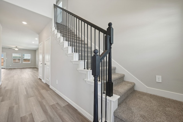 stairs featuring recessed lighting, baseboards, ceiling fan, and wood finished floors