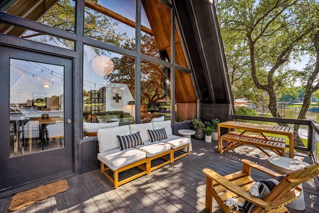 deck with an outdoor hangout area