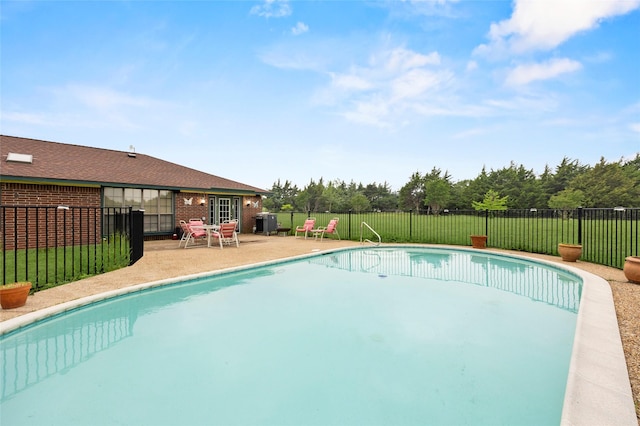 view of pool with fence, a fenced in pool, and a patio area