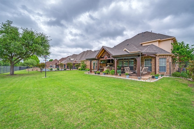 view of yard with a fenced backyard and a patio
