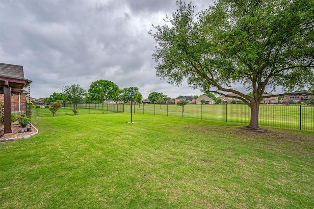 view of yard with fence