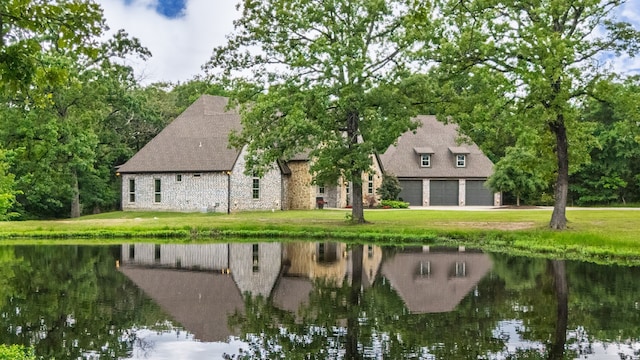 11374 Texas Highway 154 S, Yantis, TX 75497 - back of property featuring a yard, a water view, and stone siding