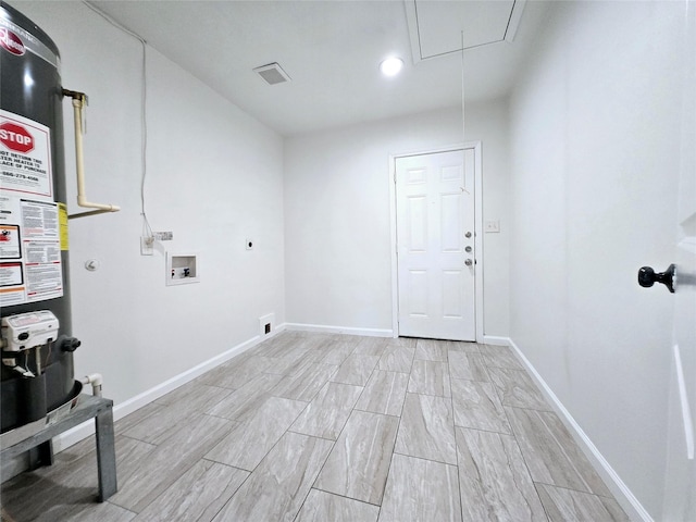 3818 Vilbig Rd, Dallas, TX 75212 - clothes washing area featuring electric dryer hookup, hookup for a washing machine, water heater, attic access, and baseboards