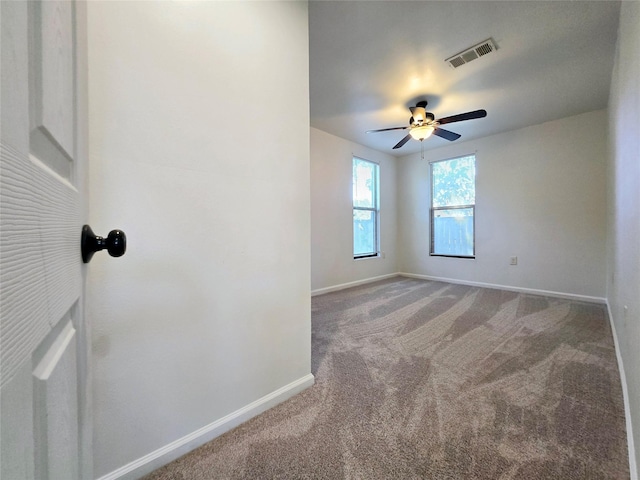 3818 Vilbig Rd, Dallas, TX 75212 - unfurnished room featuring baseboards, carpet floors, and ceiling fan
