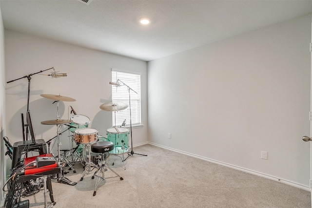game room featuring carpet floors and baseboards