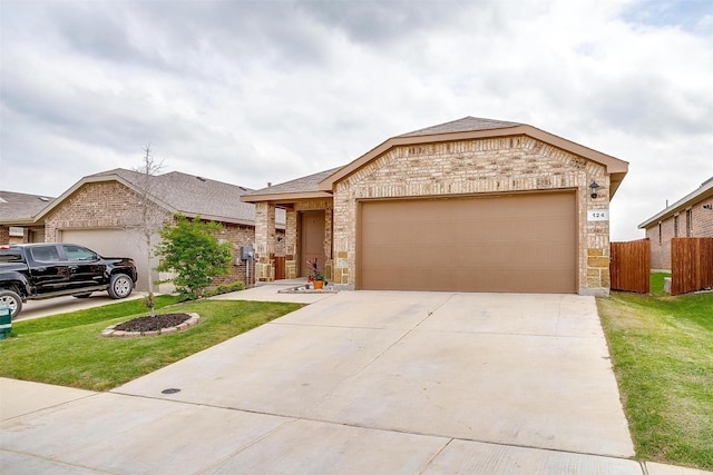 view of front facade with driveway, a front yard, brick siding, fence, and an attached garage